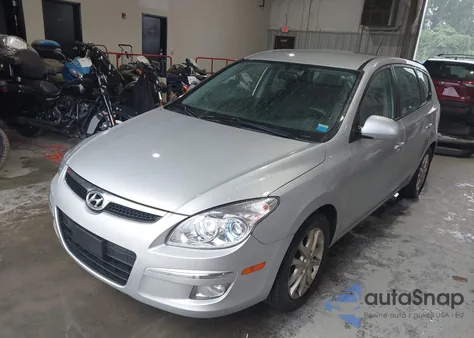 2009 Hyundai Elantra Touring from USA, damaged, VIN KMHDC86E59U041672